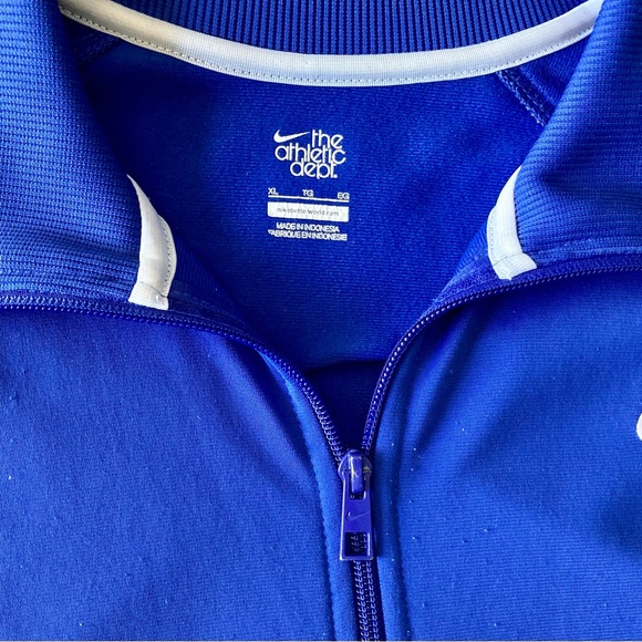 Women’s Nike The Athletic Dept. Track Jacket
Blue in color size XL - Picture 2 of 6